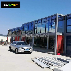 R&oslash;d og bl&aring; dobbeltgulve glasfladpakke containerhus modul&aelig;r